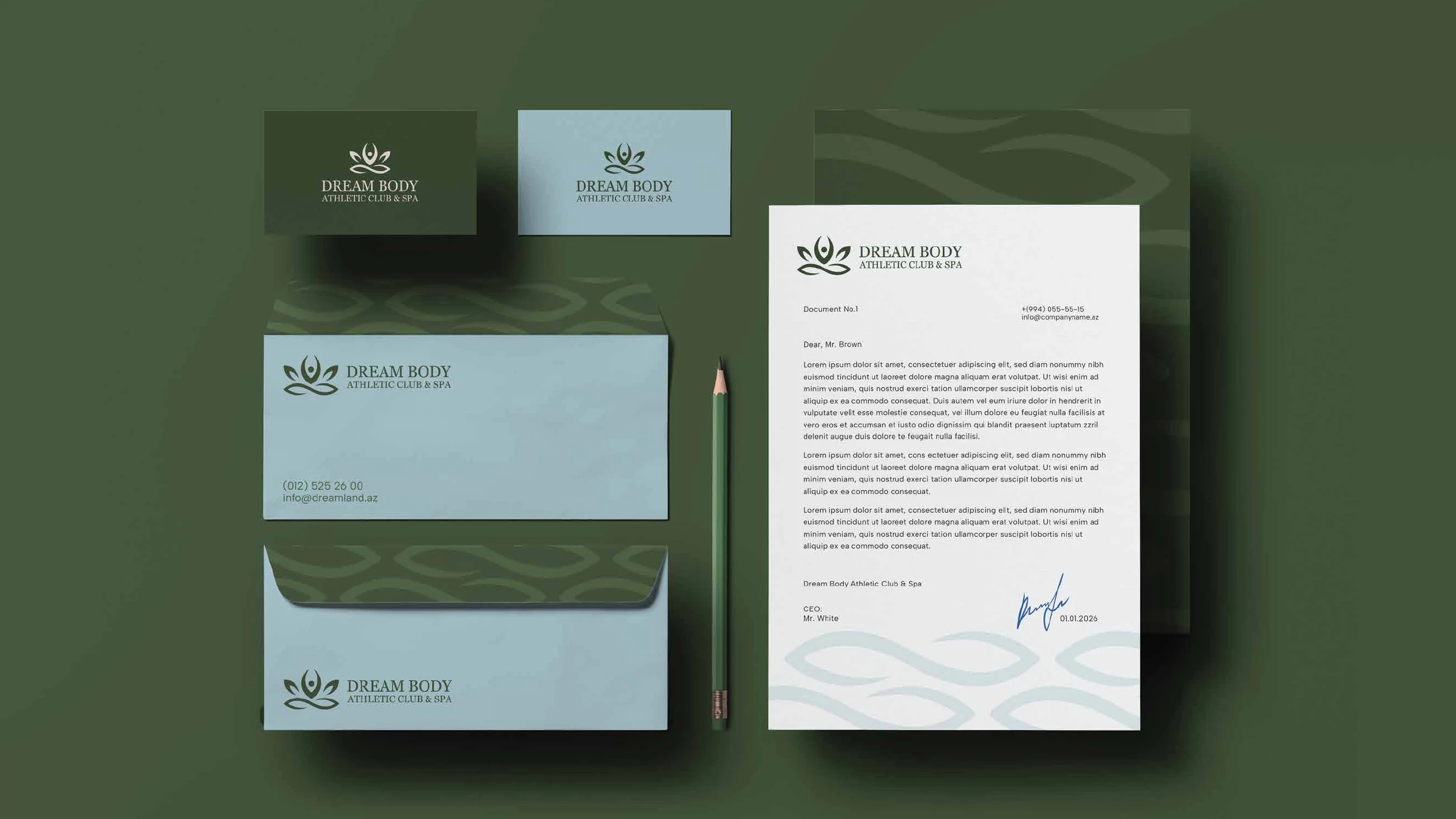 Dream Body letterhead, envelopes and business cards on dark green