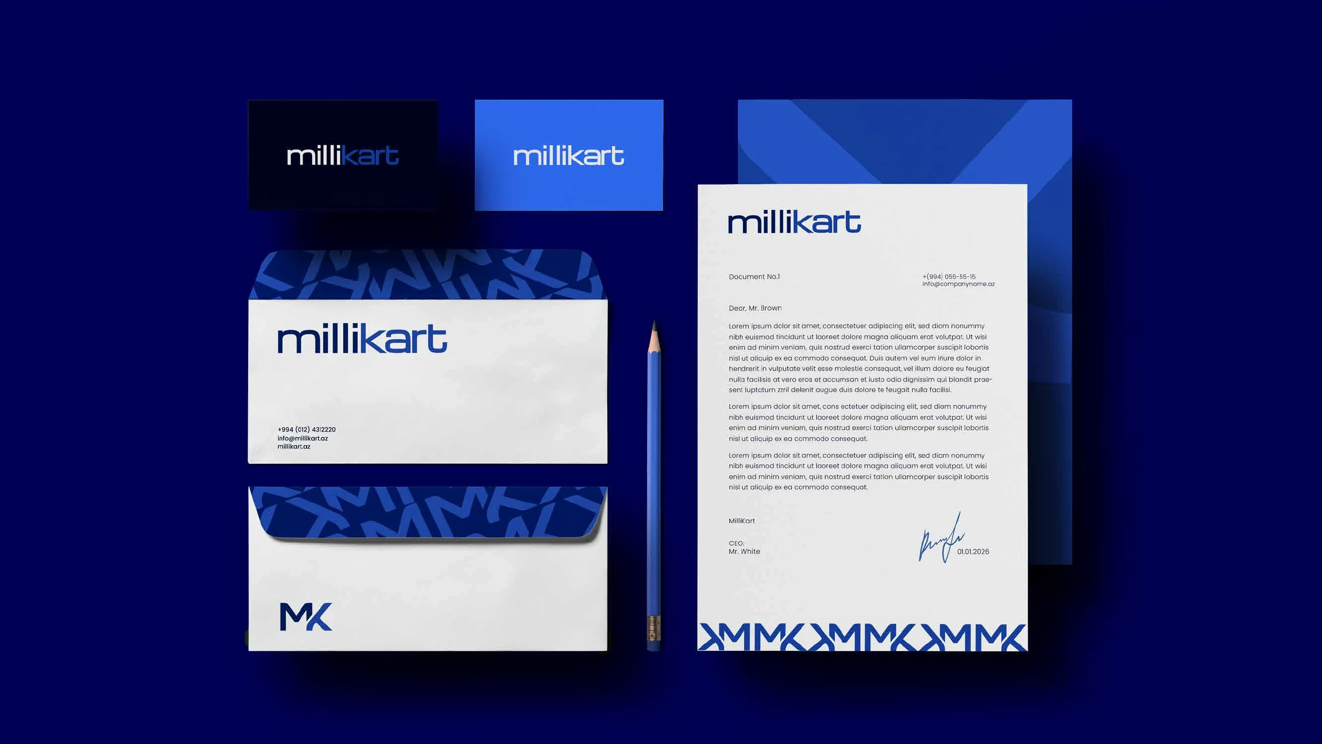 Millikart letterhead, envelopes, compliments cards and a pencil on navy